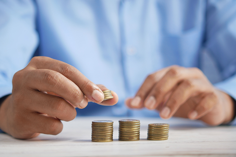 A person sorting coins